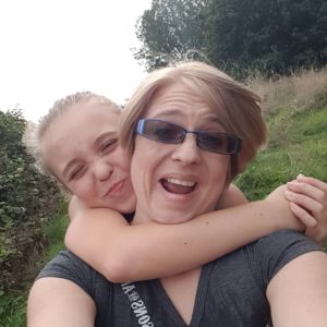 mother and teenager walking on heathland