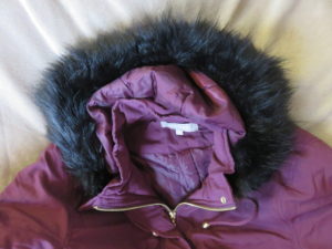 hood detail of ladies berry winter wardrobe coat