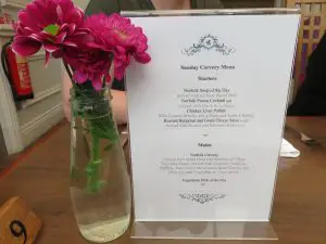 menu and place setting in carvery dining room