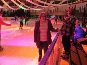 lady on ice rink
