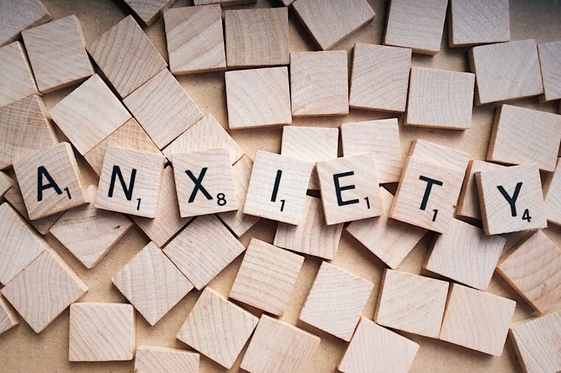 word tiles spelling out anxiety