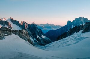 mountains with snow on in Winterwith blue sky behind them