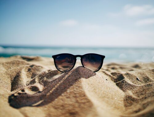 sunglasses on a beach: ways to look after yourself this summer
