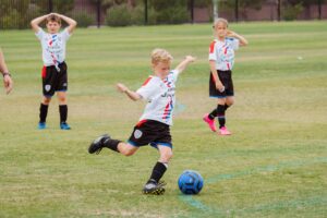 kids playing football