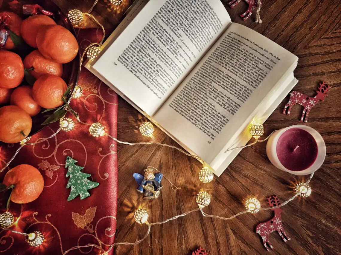 open book with Christmas decorations: unique gift ideas for book lovers this christmas