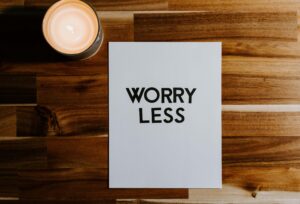 "worry less" written on a piece of paper - deal with the Sunday Scaries