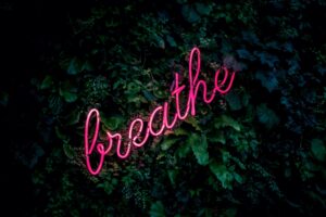 florescent words spelling out "breathe"