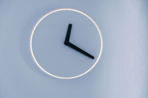 clock on a wall with no numbers just hands: make time for your blog in 2024